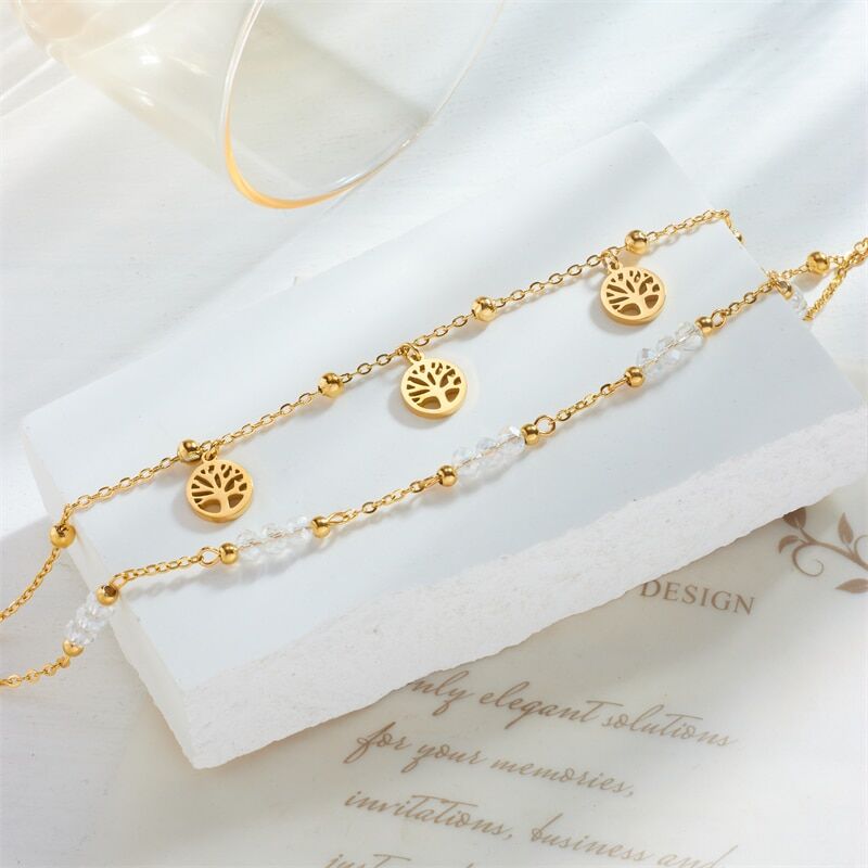 Deux bracelets de cheville en acier inoxydable arbre de vie avec une breloque arbre de vie.